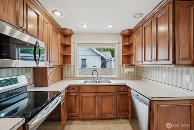 636 20th Ave, Longview, WA 98632 - kitchen featuring open shelves, stainless steel appliances, brown cabinets, and light countertops