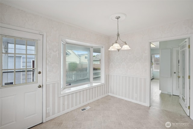 636 20th Ave, Longview, WA 98632 - unfurnished dining area featuring ornamental molding and tile patterned floors