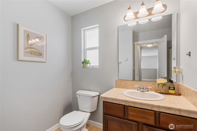 27677 256th Pl SE, Maple Valley, WA 98038 - half bathroom featuring toilet, vanity, and baseboards