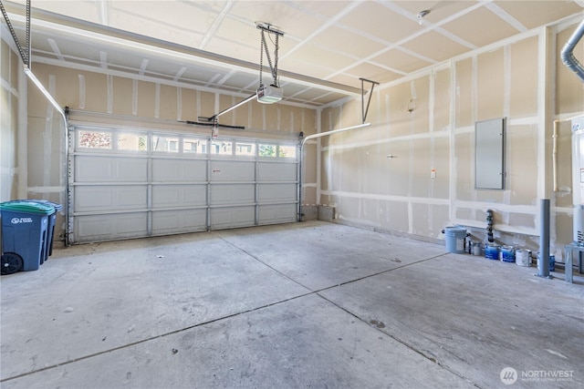 27677 256th Pl SE, Maple Valley, WA 98038 - garage featuring a garage door opener and electric panel