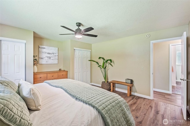 5110 Regan Rd, Cashmere, WA 98815 - bedroom featuring light wood-style flooring, baseboards, a ceiling fan, and a textured ceiling