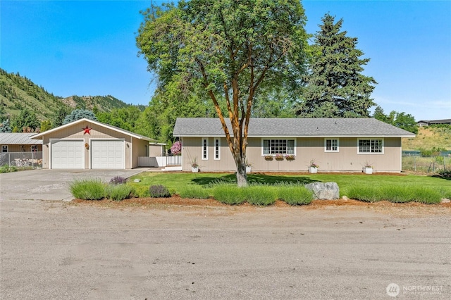 5110 Regan Rd, Cashmere, WA 98815 - single story home with a mountain view and a detached garage