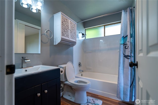 9528 Densmore Ave N, Seattle, WA 98103 - full bathroom with shower / bathtub combination with curtain, vanity, and wood finished floors