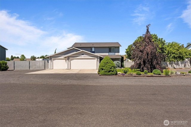 7690 Mcdougall Ave NE, Moses Lake, WA 98837 - traditional-style house featuring driveway and a garage