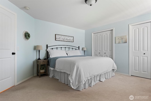 7690 Mcdougall Ave NE, Moses Lake, WA 98837 - carpeted bedroom with two closets and baseboards