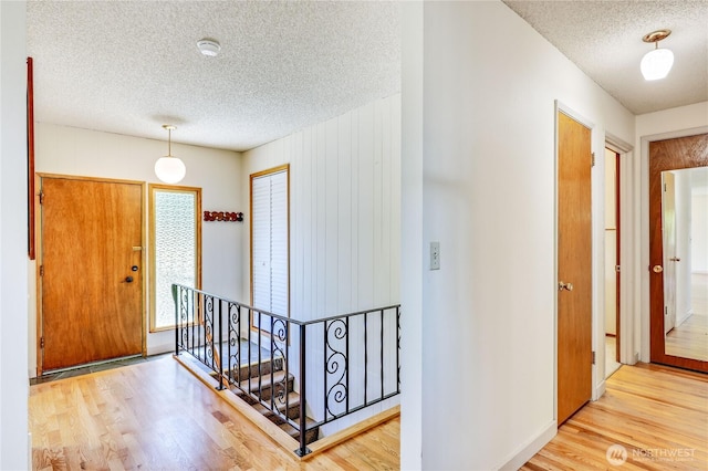 434 T St, Port Townsend, WA 98368 - entryway featuring a textured ceiling and wood finished floors