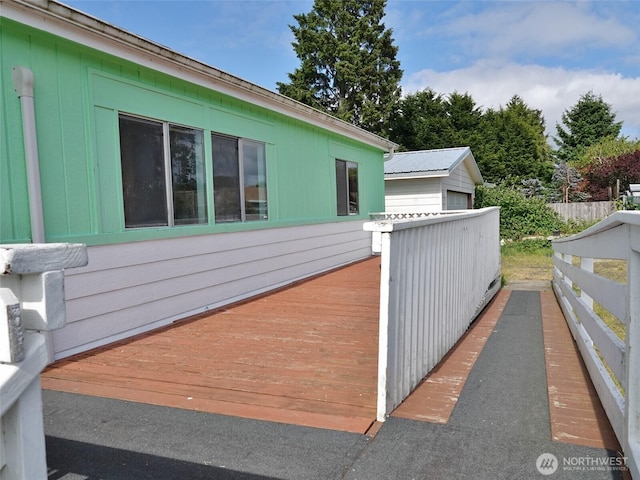 676 Copalis Ave NE, Ocean Shores, WA 98569 - view of home's exterior featuring a wooden deck