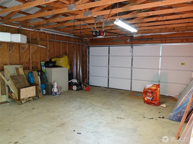 676 Copalis Ave NE, Ocean Shores, WA 98569 - garage featuring a garage door opener