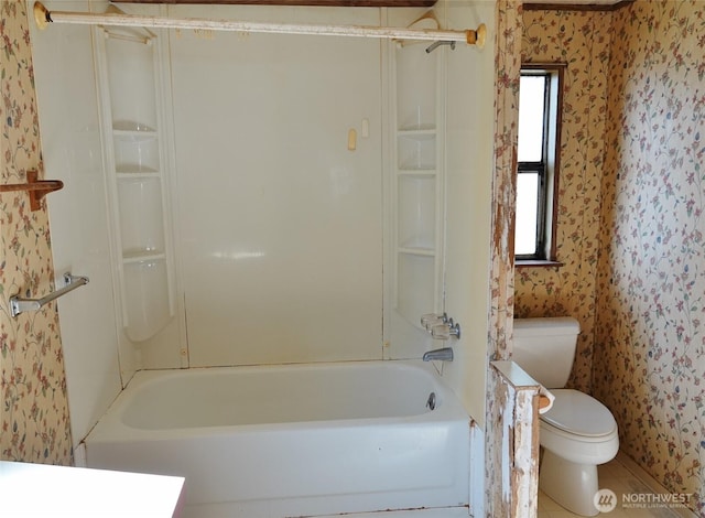 676 Copalis Ave NE, Ocean Shores, WA 98569 - full bathroom with wallpapered walls, toilet, and bathing tub / shower combination