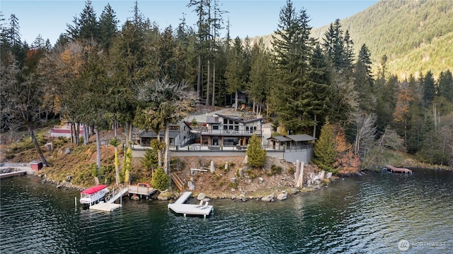 76 Thompson Point Rd, Port Angeles, WA 98363 - view of subject property featuring a forest and a large body of water