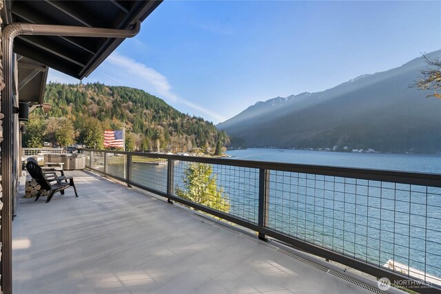76 Thompson Point Rd, Port Angeles, WA 98363 - balcony with a water and mountain view and a forest view