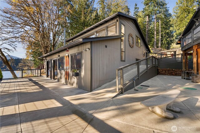 76 Thompson Point Rd, Port Angeles, WA 98363 - rear view of property featuring a patio