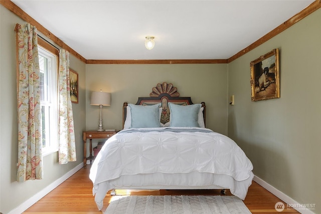 23619 74th Ave W, Edmonds, WA 98026 - bedroom with multiple windows, wood finished floors, ornamental molding, and baseboards