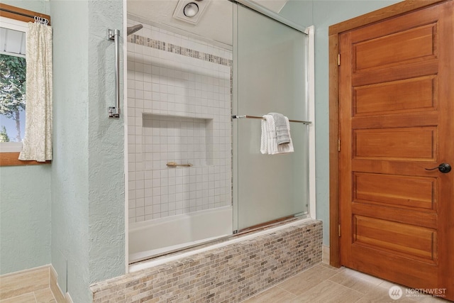 23619 74th Ave W, Edmonds, WA 98026 - bathroom featuring a textured wall and tiled shower / bath combo