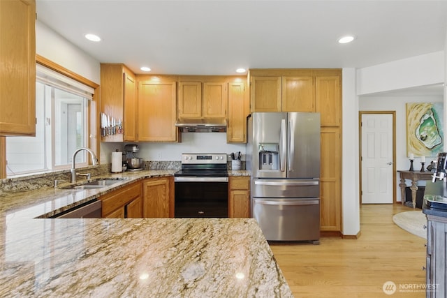 37401 Olympic View Rd NE, Hansville, WA 98340 - kitchen with stainless steel refrigerator with ice dispenser, electric range oven, a sink, under cabinet range hood, and light stone counters