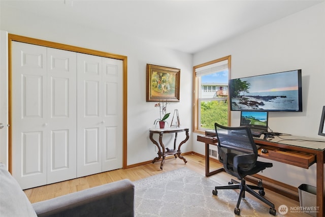 37401 Olympic View Rd NE, Hansville, WA 98340 - home office with wood finished floors and baseboards