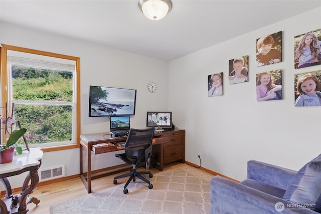 37401 Olympic View Rd NE, Hansville, WA 98340 - office space featuring light wood-style flooring and baseboards