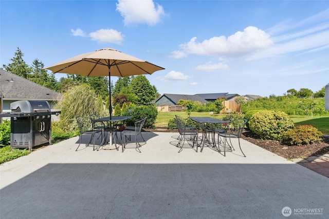 37401 Olympic View Rd NE, Hansville, WA 98340 - view of patio / terrace with grilling area and outdoor dining area