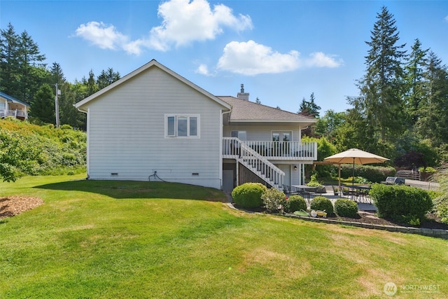37401 Olympic View Rd NE, Hansville, WA 98340 - back of house with a deck, stairway, a yard, a patio area, and a chimney