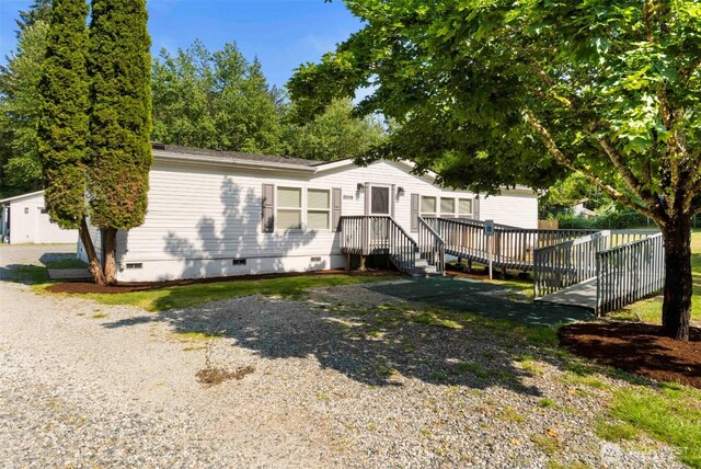 20119 120th Ave E, Graham, WA 98338 - rear view of property with crawl space and a deck