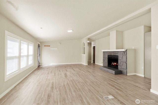 20119 120th Ave E, Graham, WA 98338 - unfurnished living room with light wood-type flooring, baseboards, a fireplace, and recessed lighting