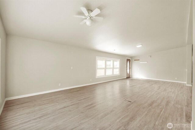 20119 120th Ave E, Graham, WA 98338 - empty room featuring baseboards, light wood-type flooring, and ceiling fan