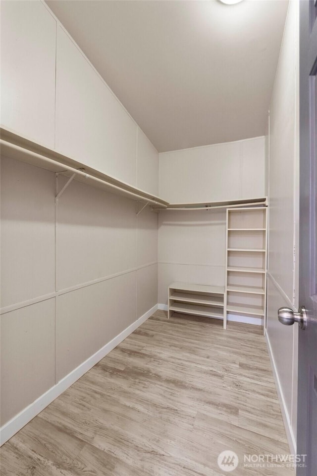 20119 120th Ave E, Graham, WA 98338 - walk in closet with wood finished floors