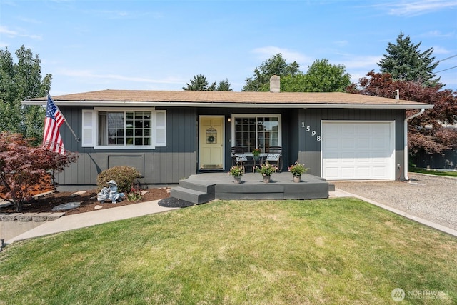 1598 Tedford St SE, East Wenatchee, WA 98802 - ranch-style home featuring an attached garage, a porch, a front yard, and driveway
