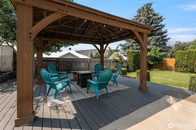 1598 Tedford St SE, East Wenatchee, WA 98802 - deck featuring a gazebo, a fire pit, and a fenced backyard