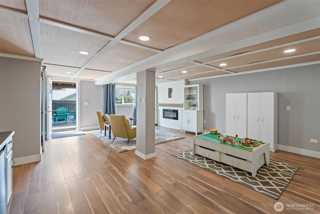 1598 Tedford St SE, East Wenatchee, WA 98802 - recreation room featuring a fireplace, wood finished floors, and recessed lighting