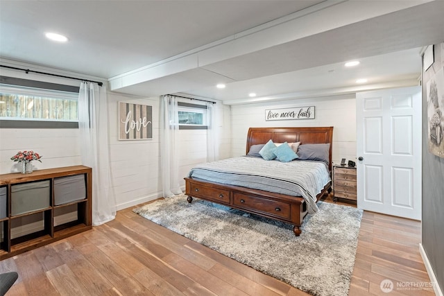 1598 Tedford St SE, East Wenatchee, WA 98802 - bedroom with light wood-style floors and concrete block wall