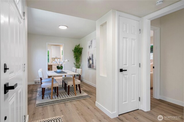 2874 30th Ave W, Seattle, WA 99819 - dining space featuring light wood finished floors and baseboards