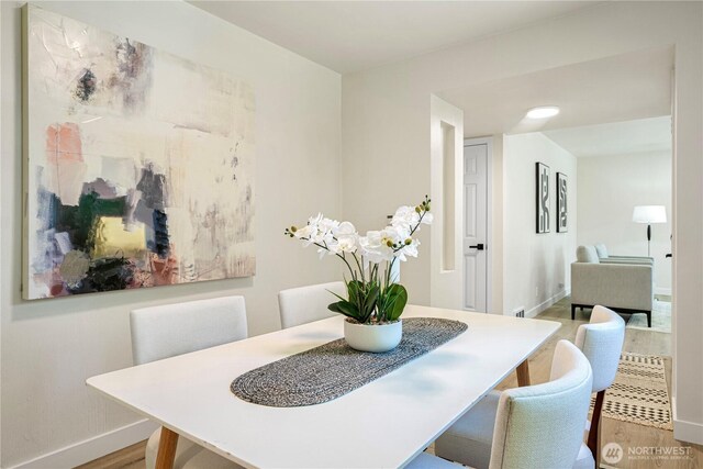 2874 30th Ave W, Seattle, WA 99819 - dining space with wood finished floors and baseboards