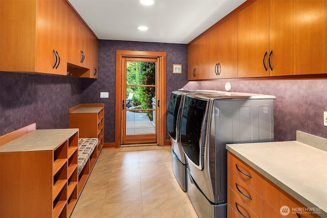 15910 Uplands Way SE, North Bend, WA 98045 - laundry room with cabinet space, washing machine and clothes dryer, and recessed lighting