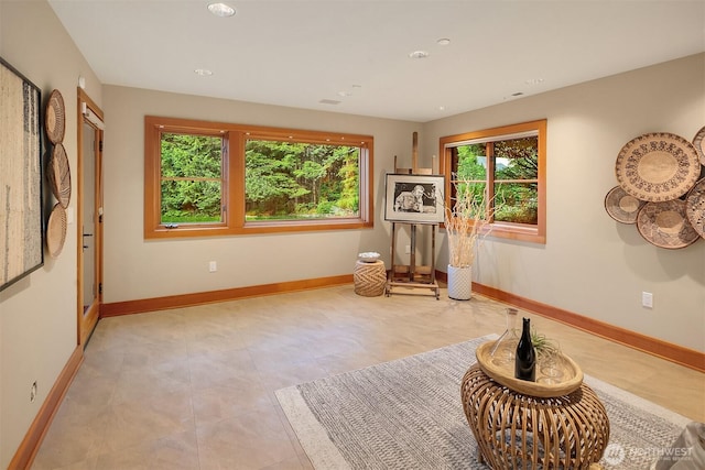 15910 Uplands Way SE, North Bend, WA 98045 - living area with plenty of natural light, baseboards, and recessed lighting