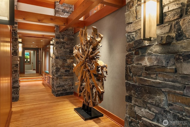 15910 Uplands Way SE, North Bend, WA 98045 - hallway featuring wood finished floors and beam ceiling