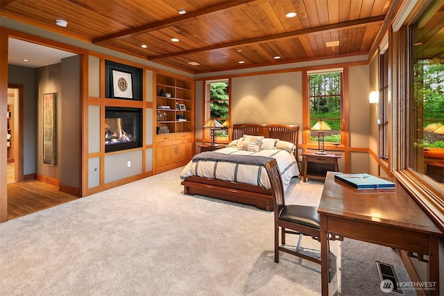 15910 Uplands Way SE, North Bend, WA 98045 - carpeted bedroom featuring wood ceiling with exposed beams, recessed lighting, and baseboards
