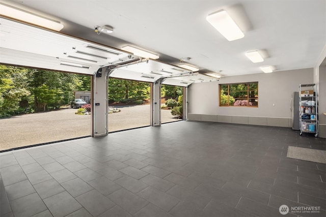 15910 Uplands Way SE, North Bend, WA 98045 - garage with freestanding refrigerator