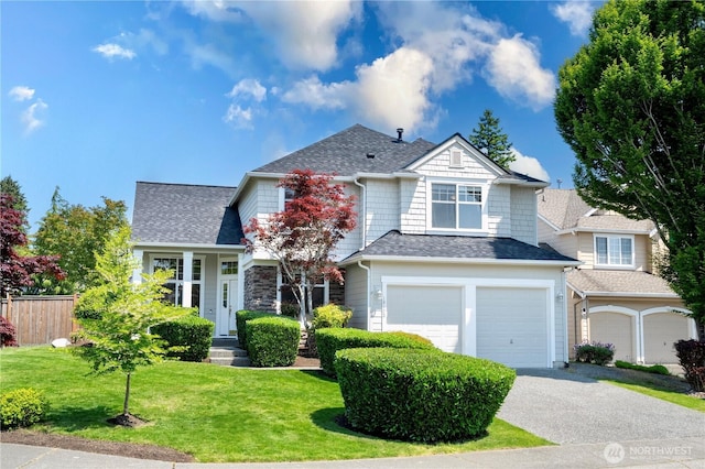 18103 32nd Ave SE, Bothell, WA 98012 - view of front facade with an attached garage, a shingled roof, and asphalt driveway