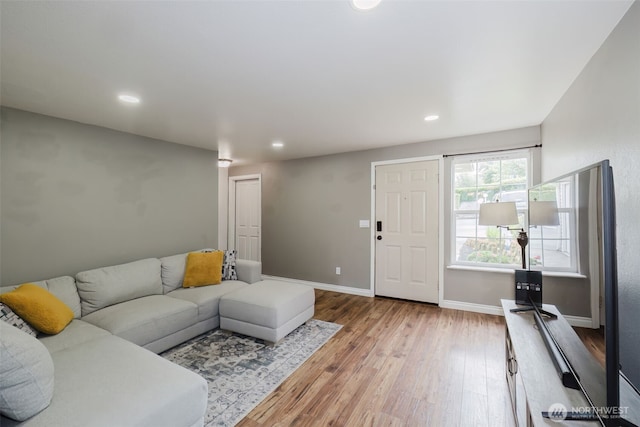 5417 99th Street Ct E, Puyallup, WA 98373 - living area featuring wood finished floors, recessed lighting, and baseboards