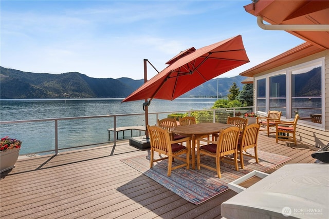 127 Bella Ln, Manson, WA 98831 - wooden terrace with a water and mountain view and outdoor dining space