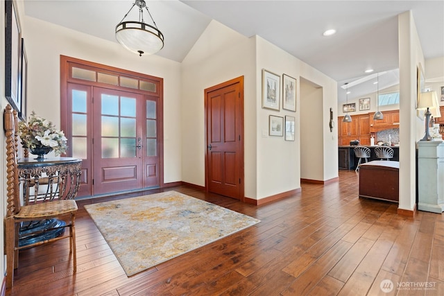 127 Bella Ln, Manson, WA 98831 - foyer entrance with lofted ceiling, wood-type flooring, baseboards, and recessed lighting
