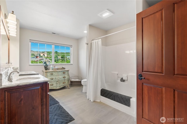 127 Bella Ln, Manson, WA 98831 - full bath with vanity, toilet, and shower / bathtub combination with curtain