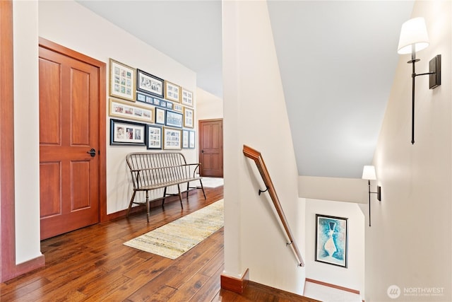 127 Bella Ln, Manson, WA 98831 - hall with an upstairs landing, hardwood / wood-style floors, and baseboards