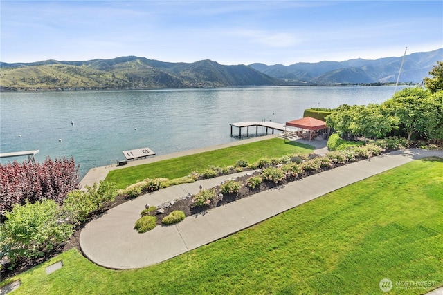 127 Bella Ln, Manson, WA 98831 - water view featuring a mountainous background and a boat dock