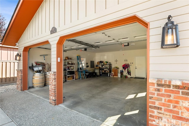 127 Bella Ln, Manson, WA 98831 - garage featuring a garage door opener and electric panel