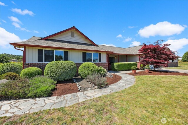 13820 Logez Ct SW, Olympia, WA 98512 - ranch-style home featuring brick siding, a front lawn, and roof with shingles