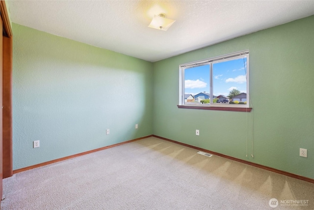 13820 Logez Ct SW, Olympia, WA 98512 - spare room with carpet floors and baseboards