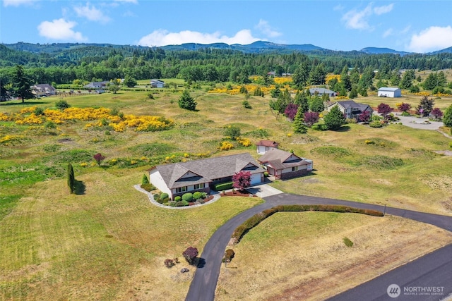 13820 Logez Ct SW, Olympia, WA 98512 - view from above of property featuring a heavily wooded area and a mountain backdrop