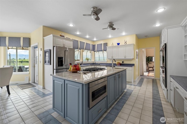 1702 Jb George Rd, Walla Walla, WA 99362 - kitchen with a sink, appliances with stainless steel finishes, white cabinetry, ceiling fan, and recessed lighting